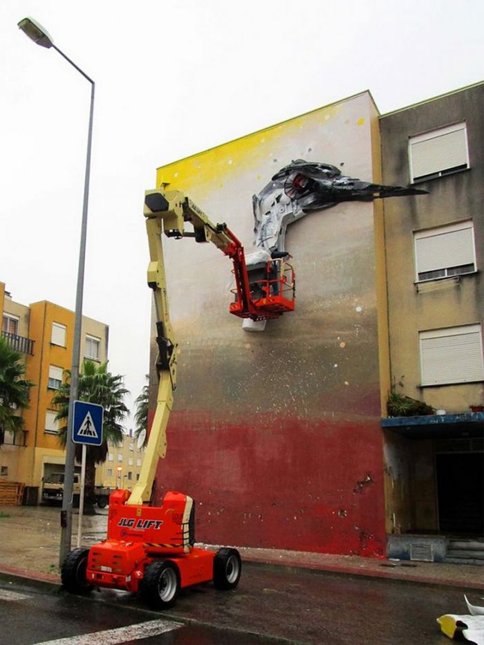 recycled-sculptures-street-art-trash-animals-bordalo_09